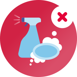 Un cercle rouge avec un dessin bleu représentant un flacon de spray nettoyant et un savon moussant à l'intérieur, avec un x rouge pour représenter les produits qui ne doivent pas être utilisés pour nettoyer l'équipement CPAP.