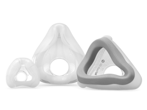 Trois types différents de coussins de masque CPAP ResMed sur fond blanc